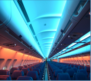 Interior of an airplane cabin with lights on representing Ameen interior LED light production