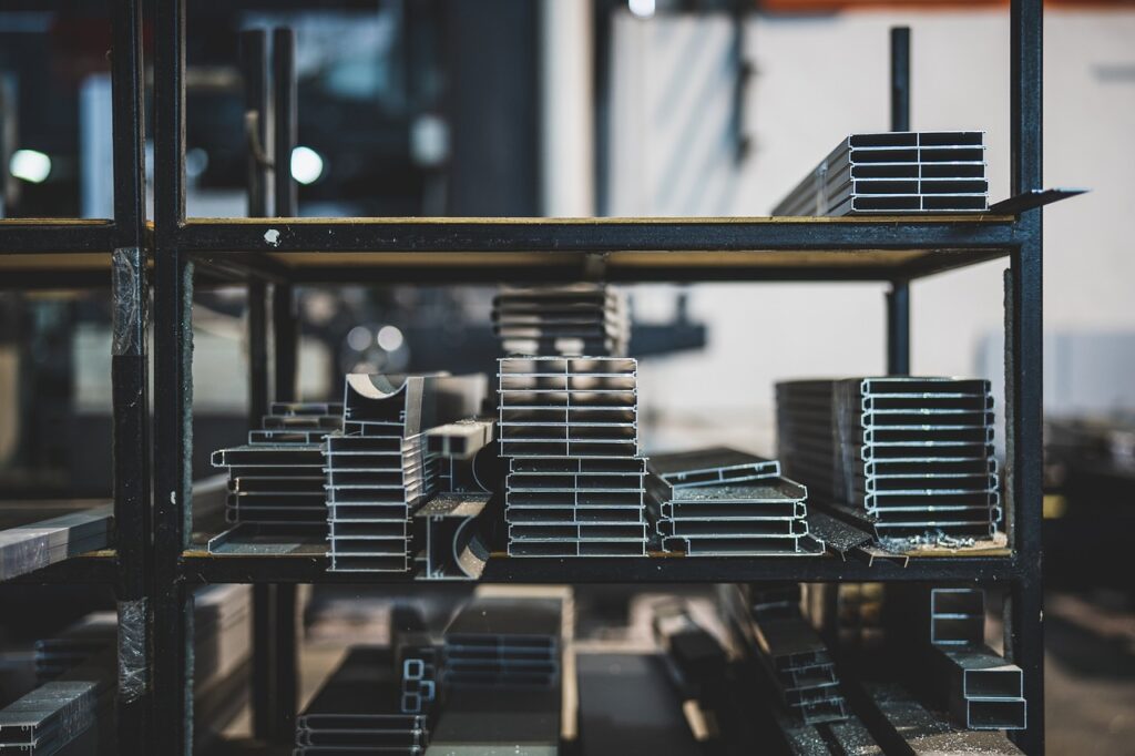 a shelf a metalic parts representing of Ameen Production organization